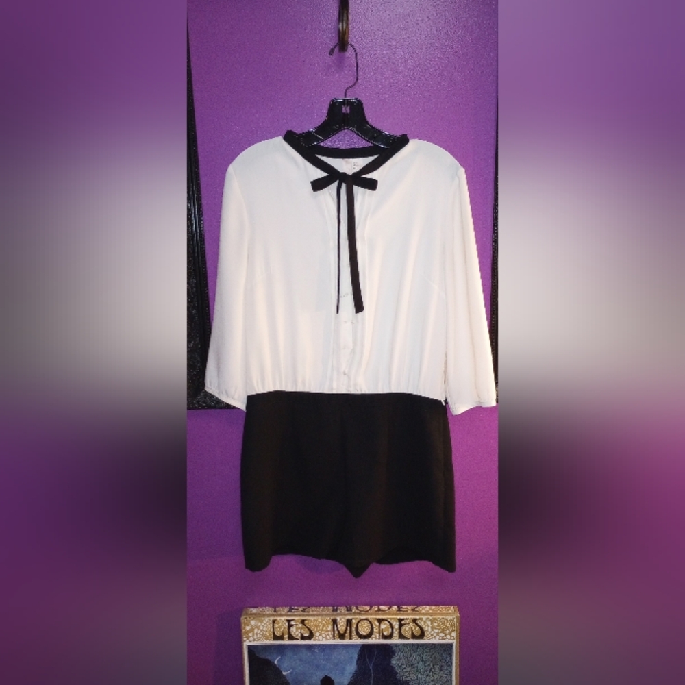 Forever 21 long sleeve shorts one piece romper. Black and White. Size Large